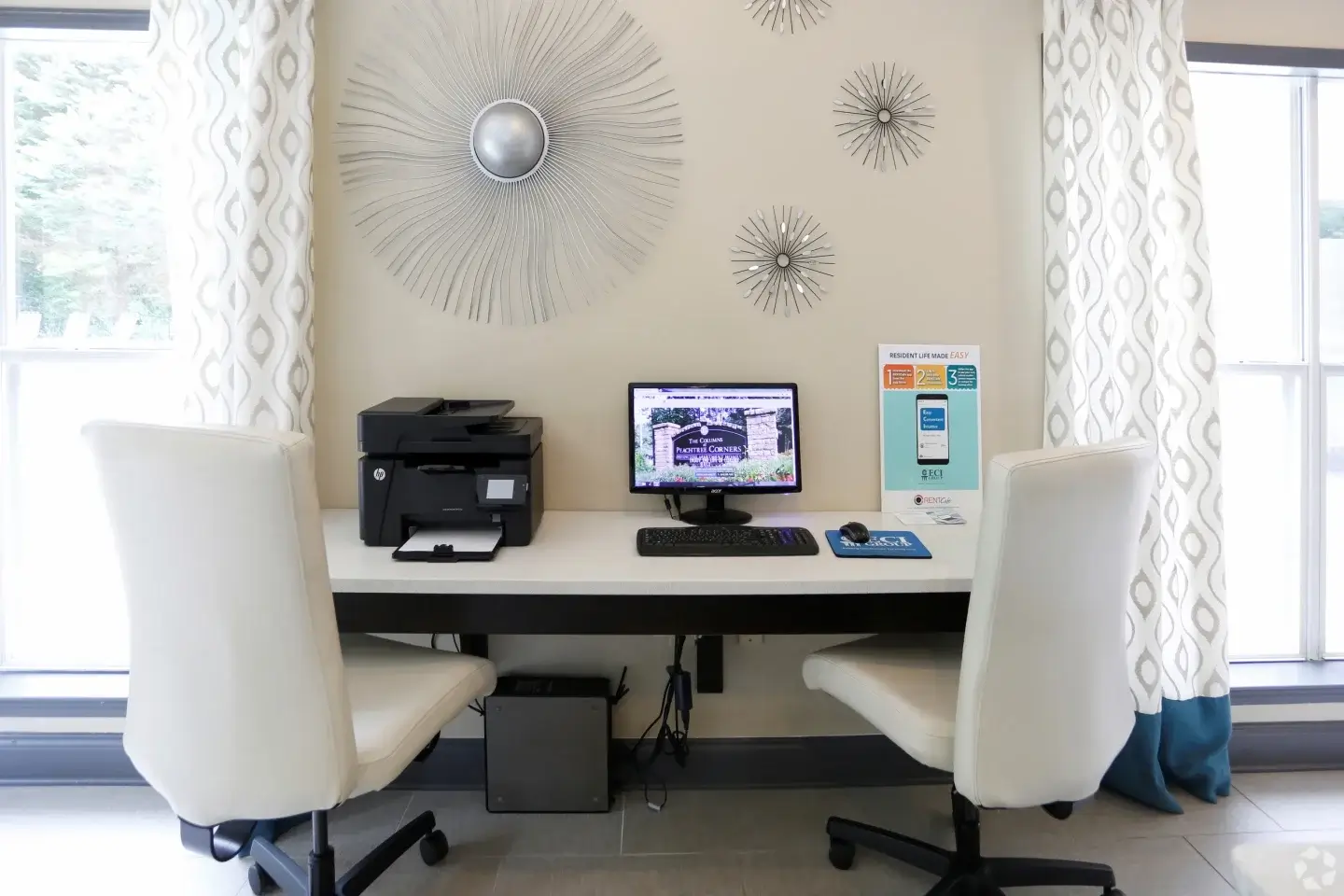 Resident computer workspace with desk seating at Norcross Crossings apartments