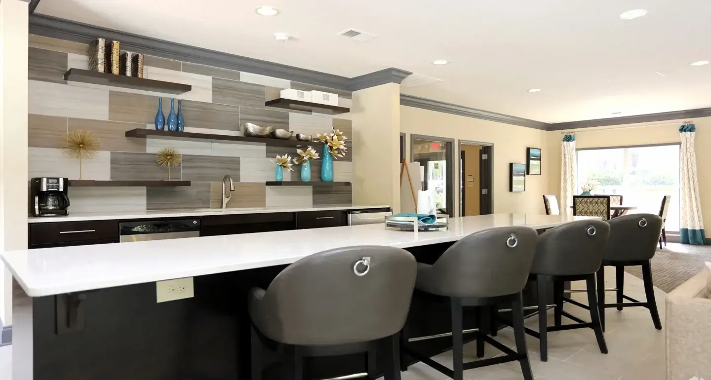 Clubhouse kitchen and bar seating at Norcross Crossings in Peachtree Corners